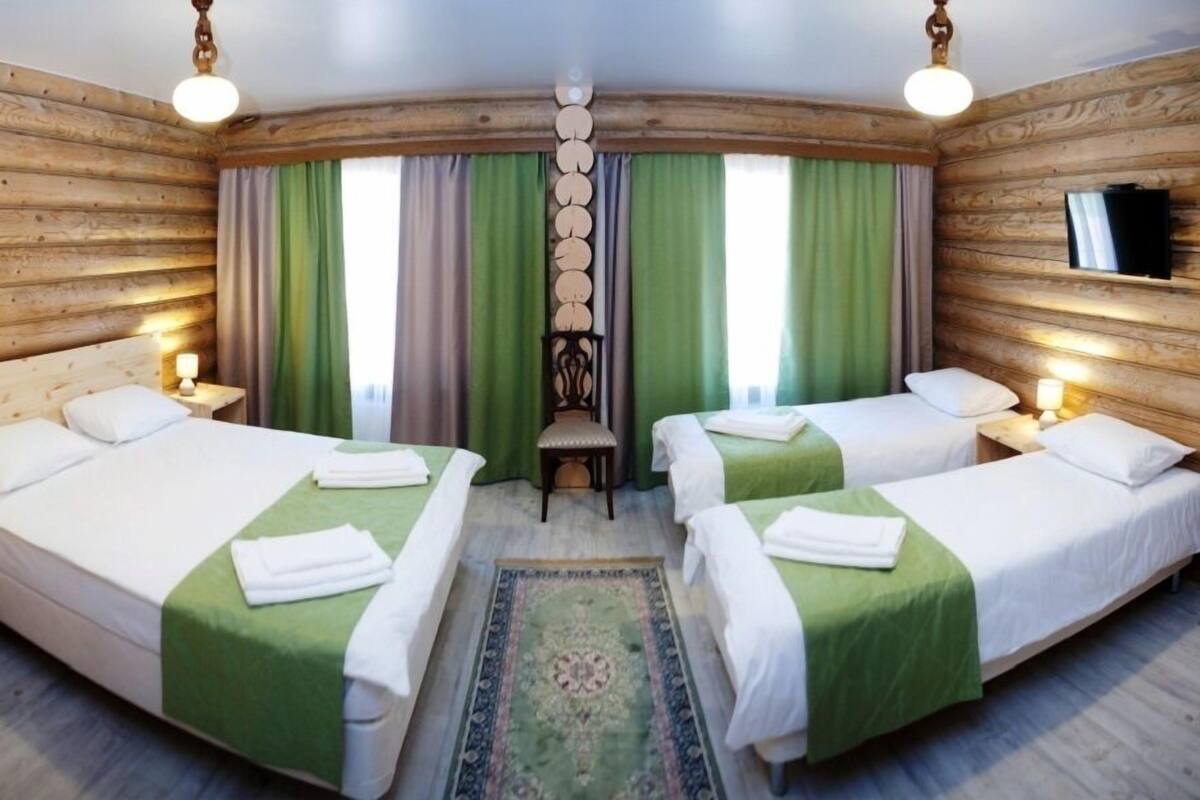 Family Room, Multiple Beds | Blackout drapes, iron/ironing board, free WiFi, bed sheets