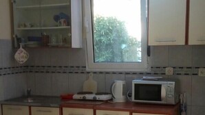 Apartemen Ekonomi, Beberapa Tempat Tidur | Setrika/meja setrika, Wi-Fi gratis, dan seprai linen
