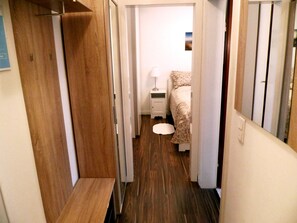 Apartamento conforto, 1 quarto | Frigobar, cofres nos quartos, cortinas blackout, quartos à prova de som