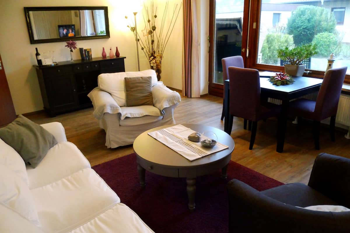 Comfort Apartment, 1 Bedroom | Minibar, in-room safe, blackout drapes, soundproofing