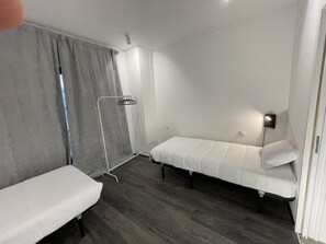 Twin Room, Private Bathroom | Blackout curtains, bed sheets, wheelchair access - HI Parque das Nações – Pousada de Juventude - Hostel (Lisbon)