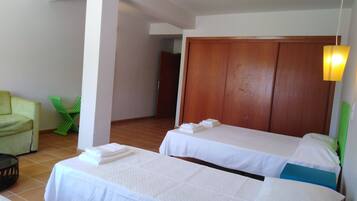 Family Quadruple Room | Blackout drapes, free WiFi, bed sheets