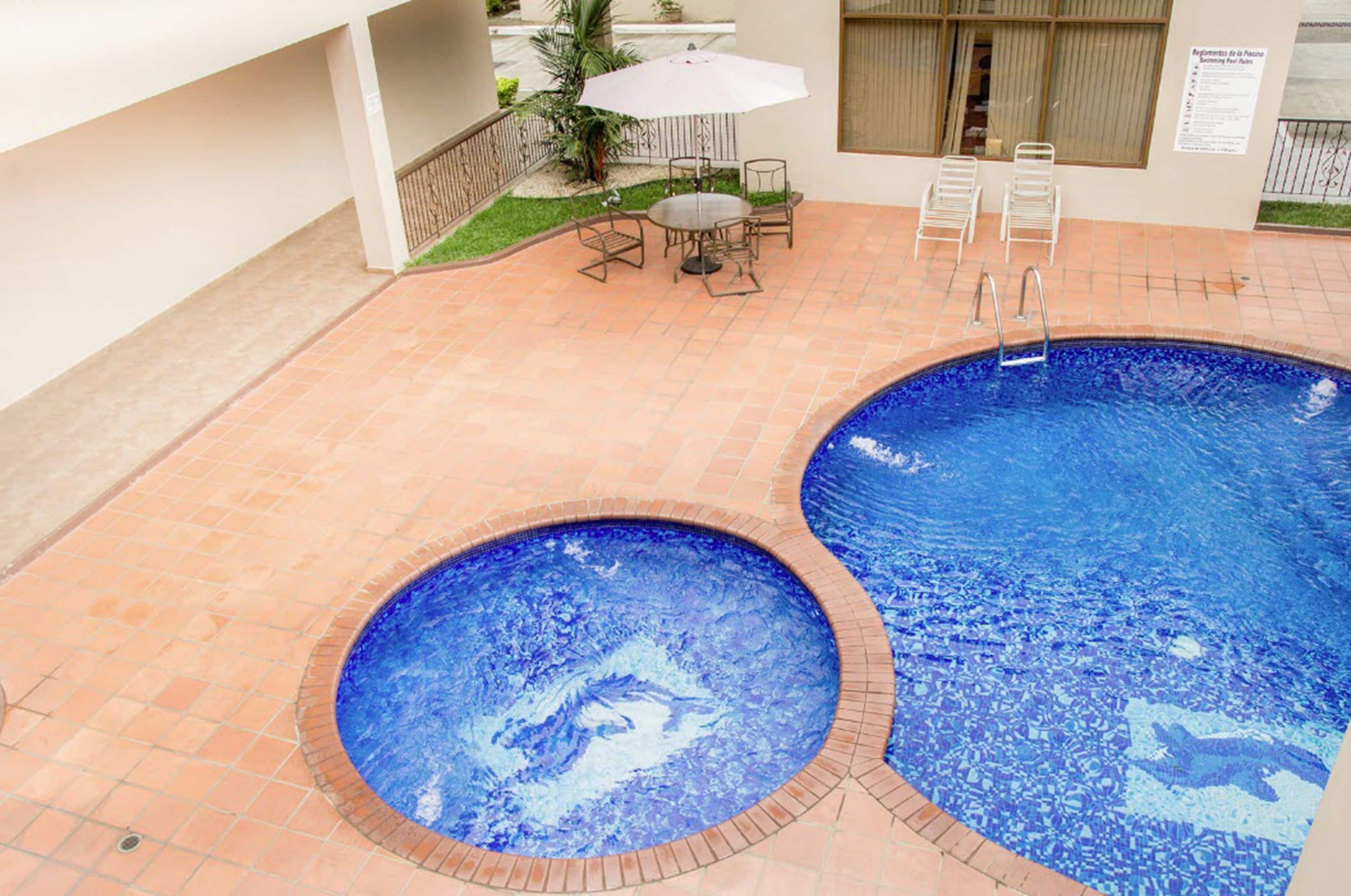 2 outdoor pools, open 7:00 am to 5:00 pm, pool umbrellas, pool loungers