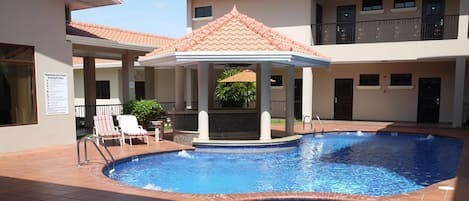 2 outdoor pools, open 7:00 AM to 5:00 PM, pool umbrellas, sun loungers