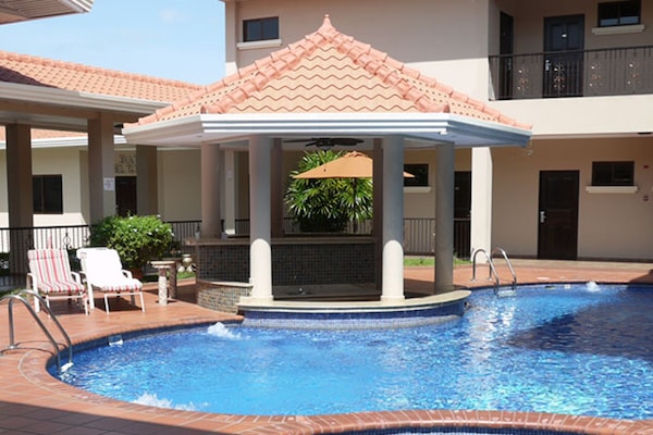 2 outdoor pools, open 7:00 AM to 5:00 PM, pool umbrellas, sun loungers