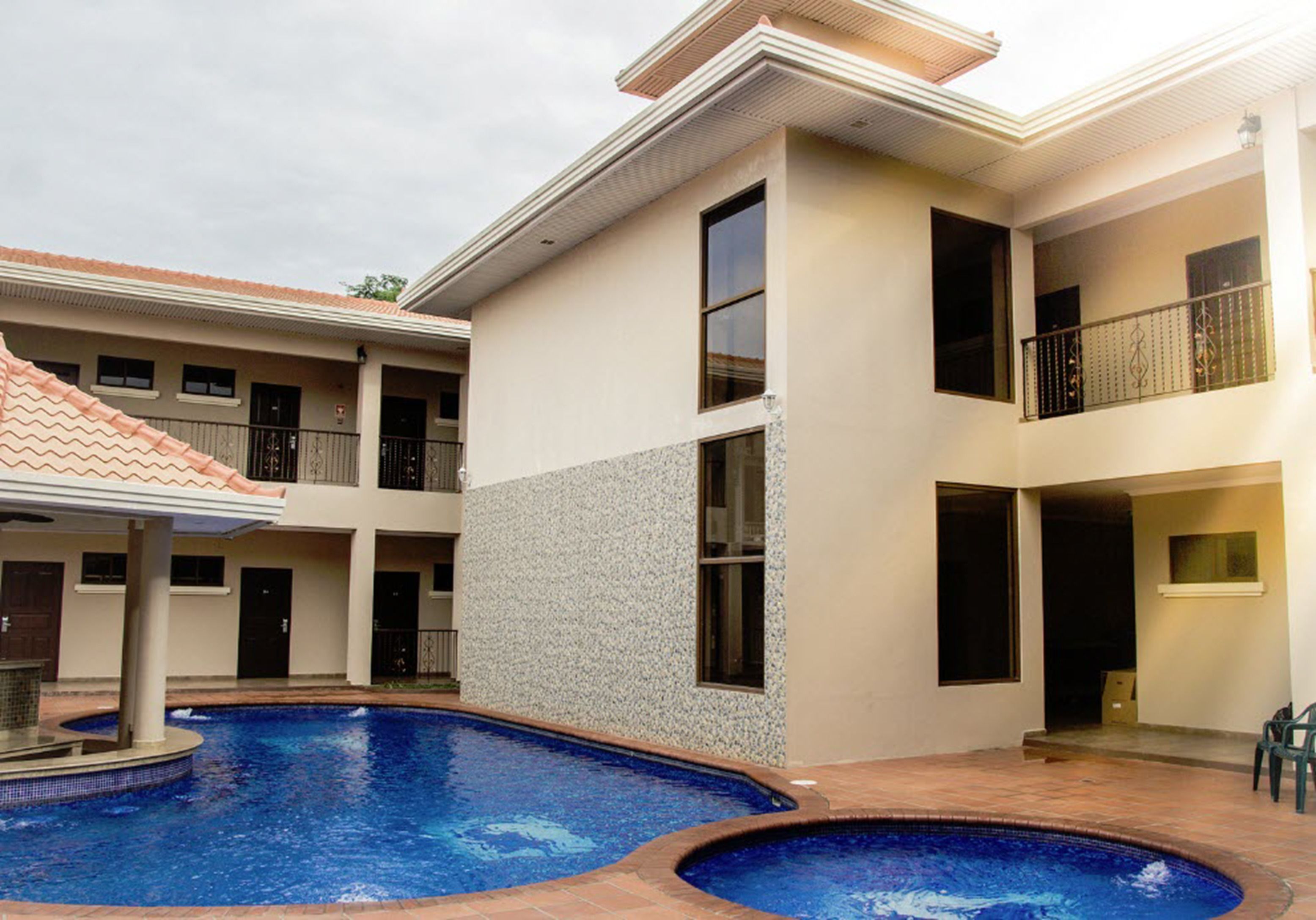 2 outdoor pools, open 7:00 am to 5:00 pm, pool umbrellas, pool loungers