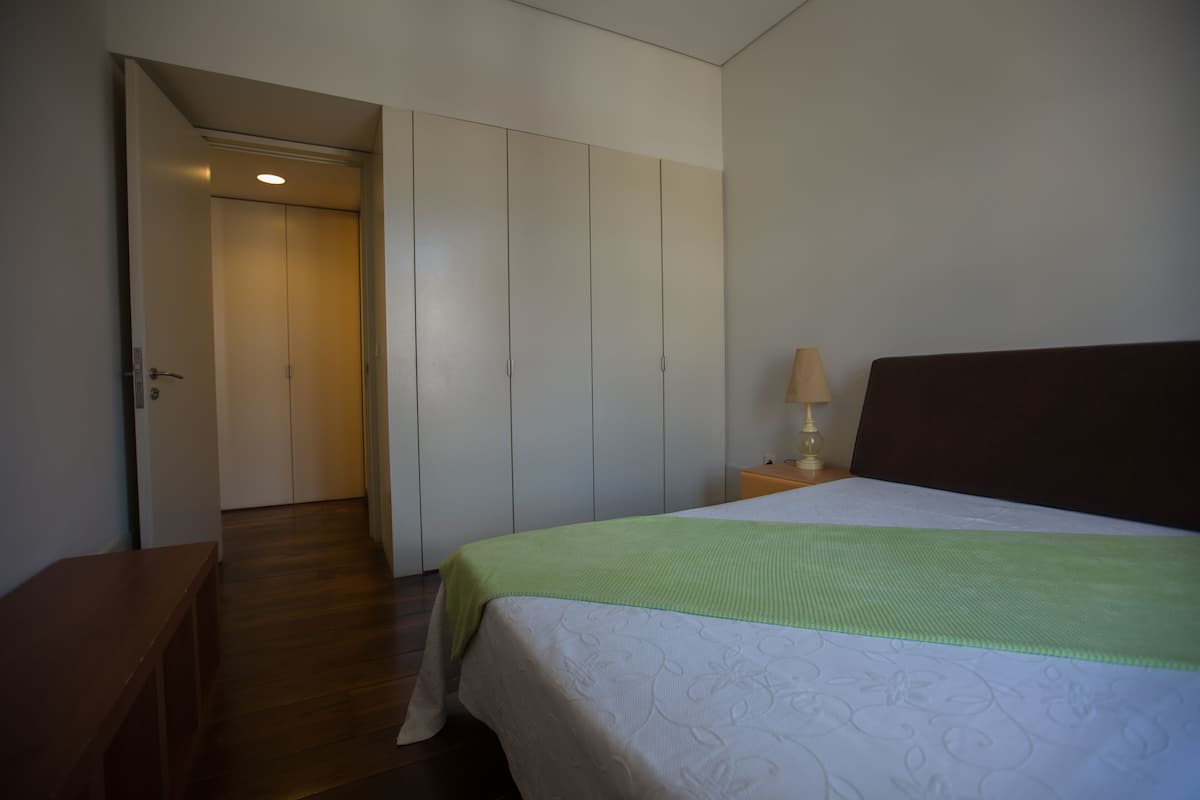Apartment, 1 Bedroom | 6 bedrooms, blackout drapes, iron/ironing board, free WiFi