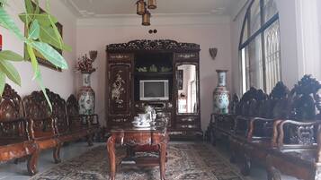 21-inch flat-screen TV with cable channels, TV