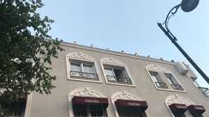 A building with multiple windows, some with awnings labeled "FATIMAH TERRACE". - Fairytale Hotel (Istanbul)