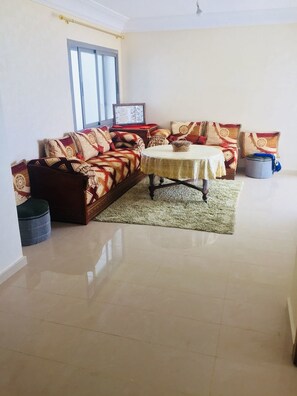 Apartment, 2 Bedrooms | Living area | Flat-screen TV - Beach house with pools (Sidi Rahal)