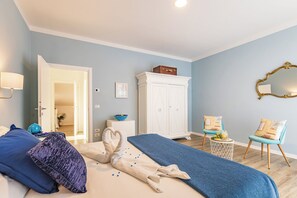 Deluxe Room, Balcony | 1 bedroom, premium bedding, down comforters, minibar