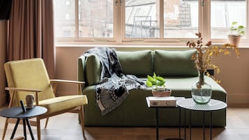 Two Bedroom Suite - Family of 3 | Living area | 42-inch Smart TV with digital channels, TV