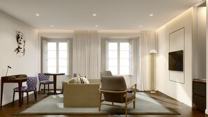 Uma sala de estar moderna com um sofá, cadeiras, uma mesa de centro, uma televisão e um quadro na parede.