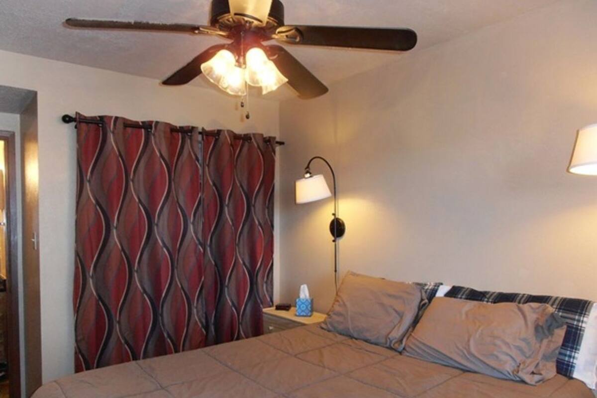 Condo, 1 Bedroom | Iron/ironing board, WiFi (free), bed sheets
