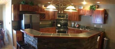 Condo, 3 Bedrooms | Private kitchen | Fridge, microwave