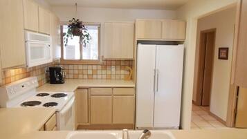 Condo, 2 Bedrooms | Private kitchen | Fridge, microwave