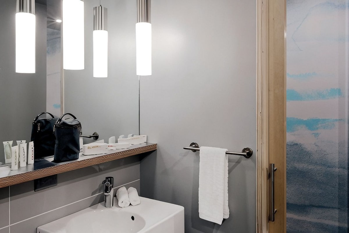 Eco-friendly toiletries, hair dryer, bathrobes, slippers