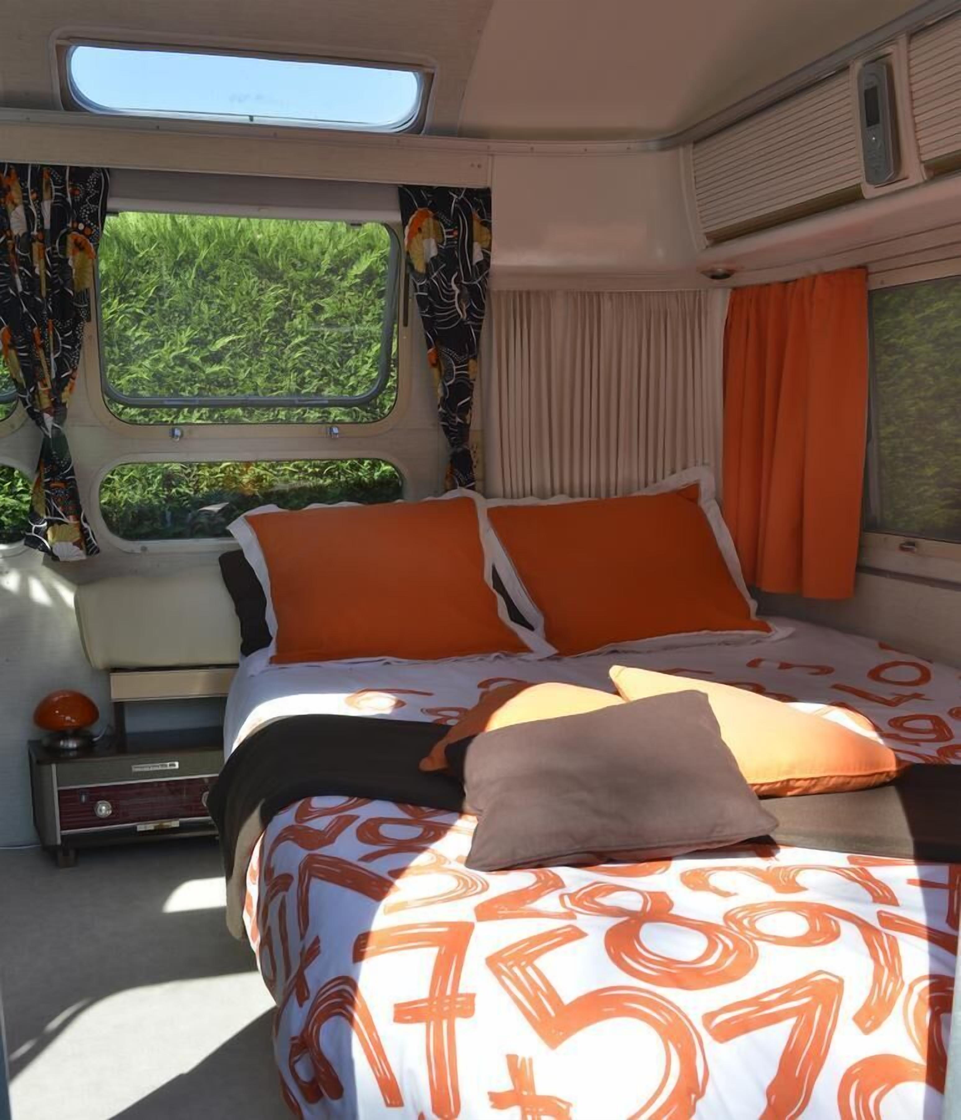 Caravan | Blackout drapes, iron/ironing board, bed sheets