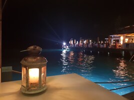 White sand, beach towels