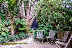 Terrace/patio - Pohutukawa Lake House. Relax in comfort in our well equipped lake house. (Lake Tarawera)