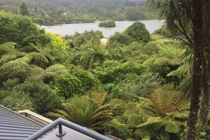 Property grounds - Pohutukawa Lake House. Relax in comfort in our well equipped lake house. (Lake Tarawera)