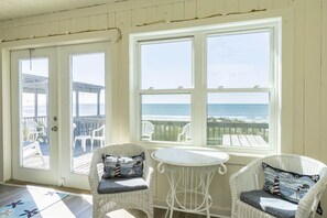 Enjoy the ocean view from the comfort of your room, which features a deck and stylish seating area.