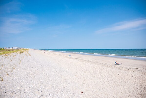 On the beach - Riverwatch: Oceanfront Condo with Covered Porch, Community Pool (Oak Island)