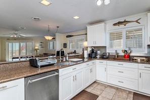 Dishwasher, coffee/tea maker, cookware/dishes/utensils, ice maker - Riverwatch: Oceanfront Condo with Covered Porch, Community Pool (Oak Island)