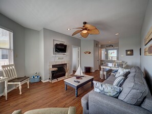 Smart TV, fireplace, books