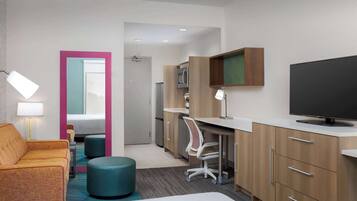 Desk, blackout drapes, iron/ironing board, cribs (surcharge)
