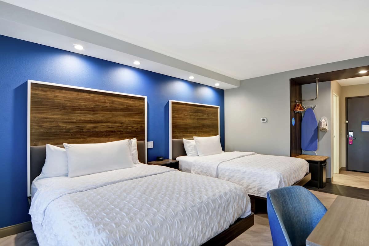 room, 2 queen beds | desk, laptop workspace, iron/ironing board, free wifi