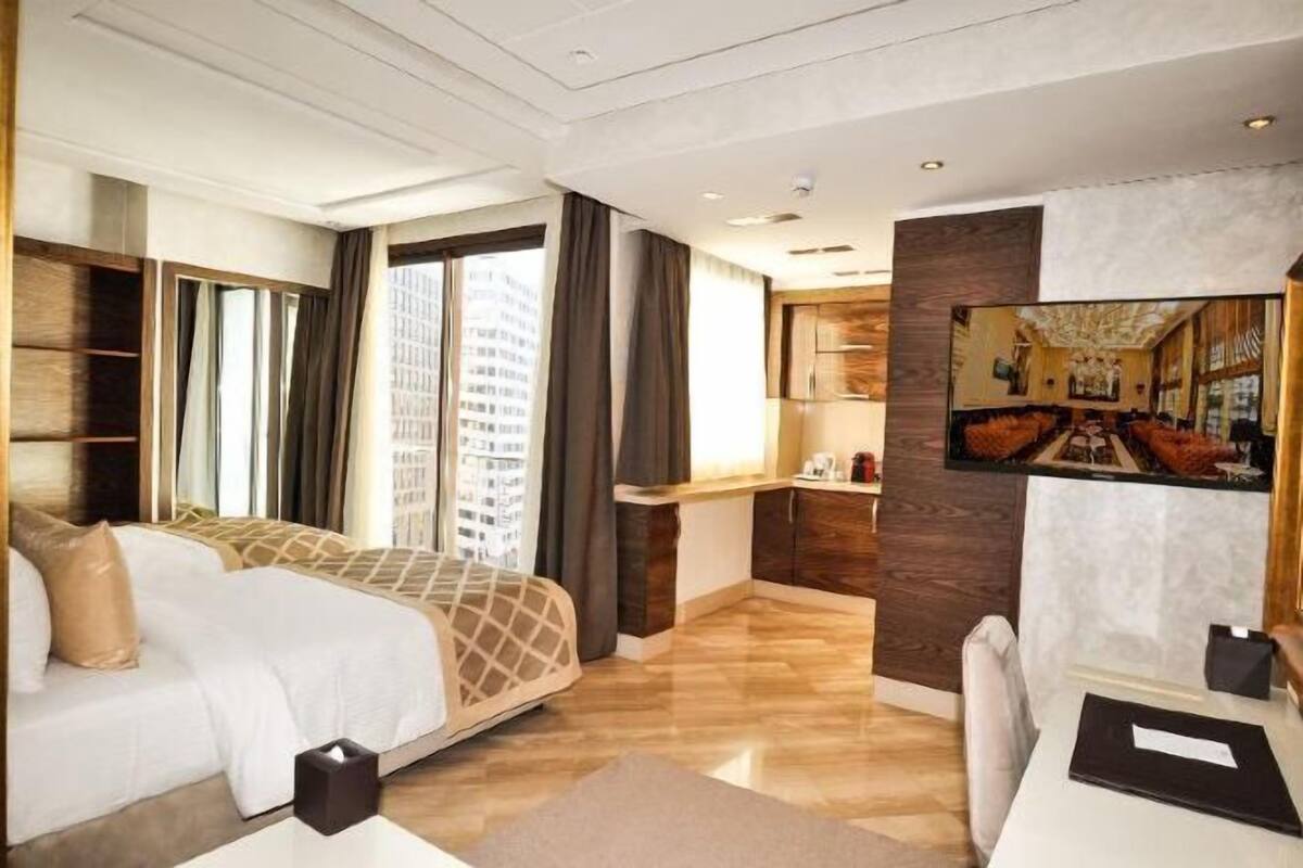 Premium bedding, pillow-top beds, free minibar items, in-room safe