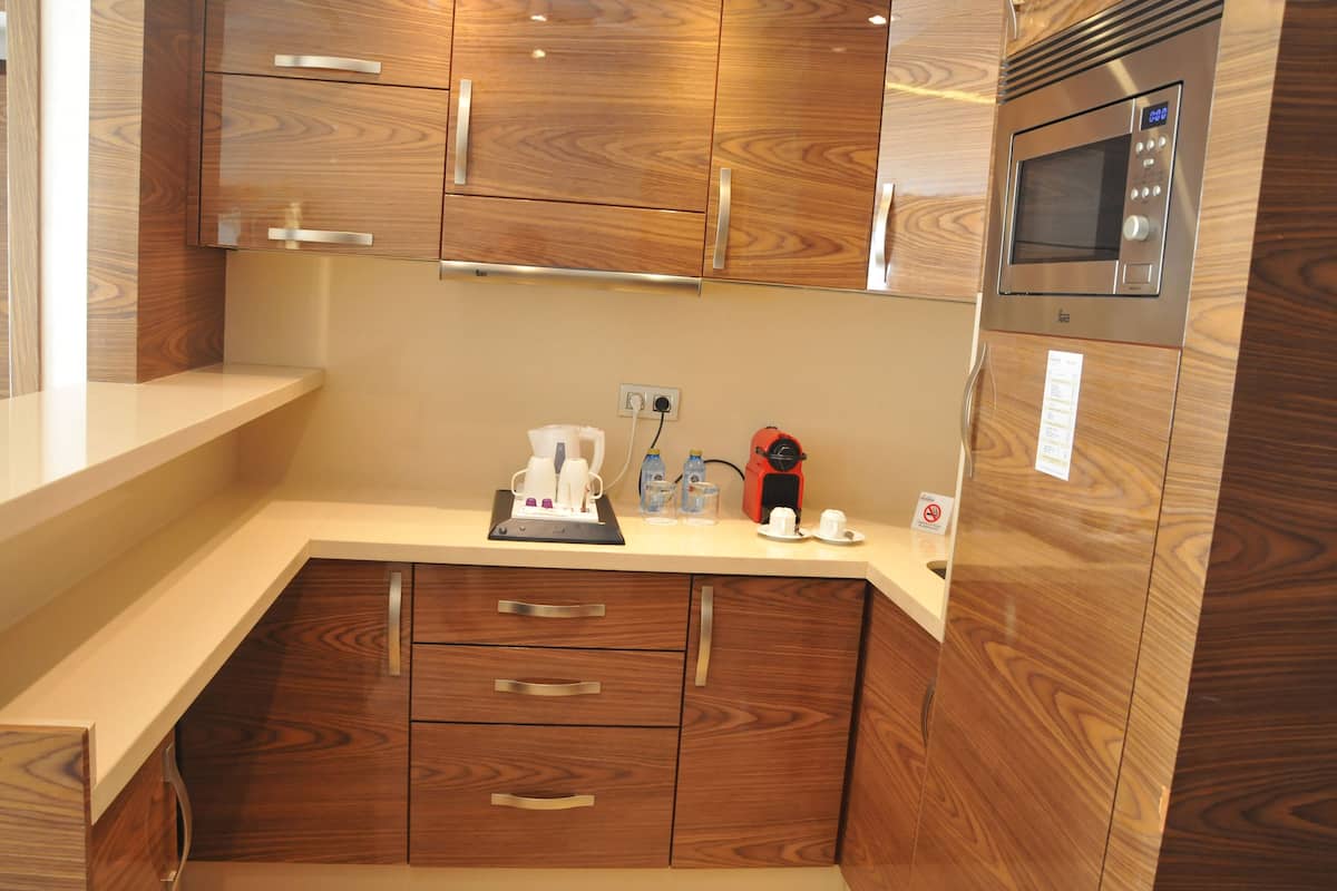 classic junior suite king bed | private kitchen | microwave, espresso maker, coffee/tea maker, electric kettle