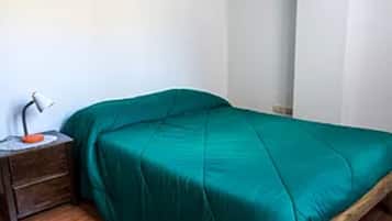 Desk, blackout drapes, iron/ironing board, free rollaway beds