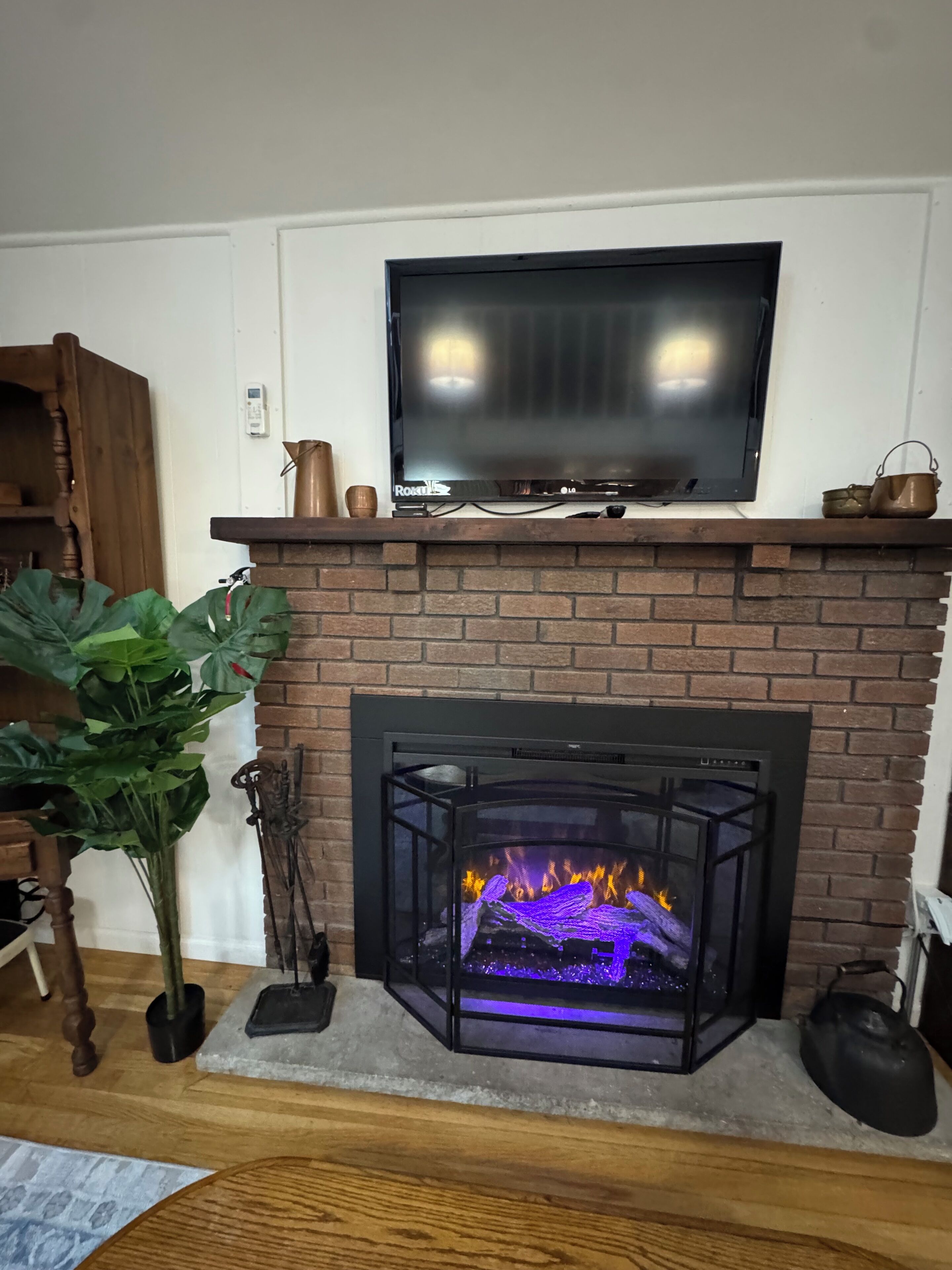 42-inch TV with cable channels, fireplace, DVD player