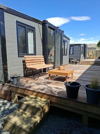 Deluxe Cabin | Terrace/patio. Mackenzie Motels