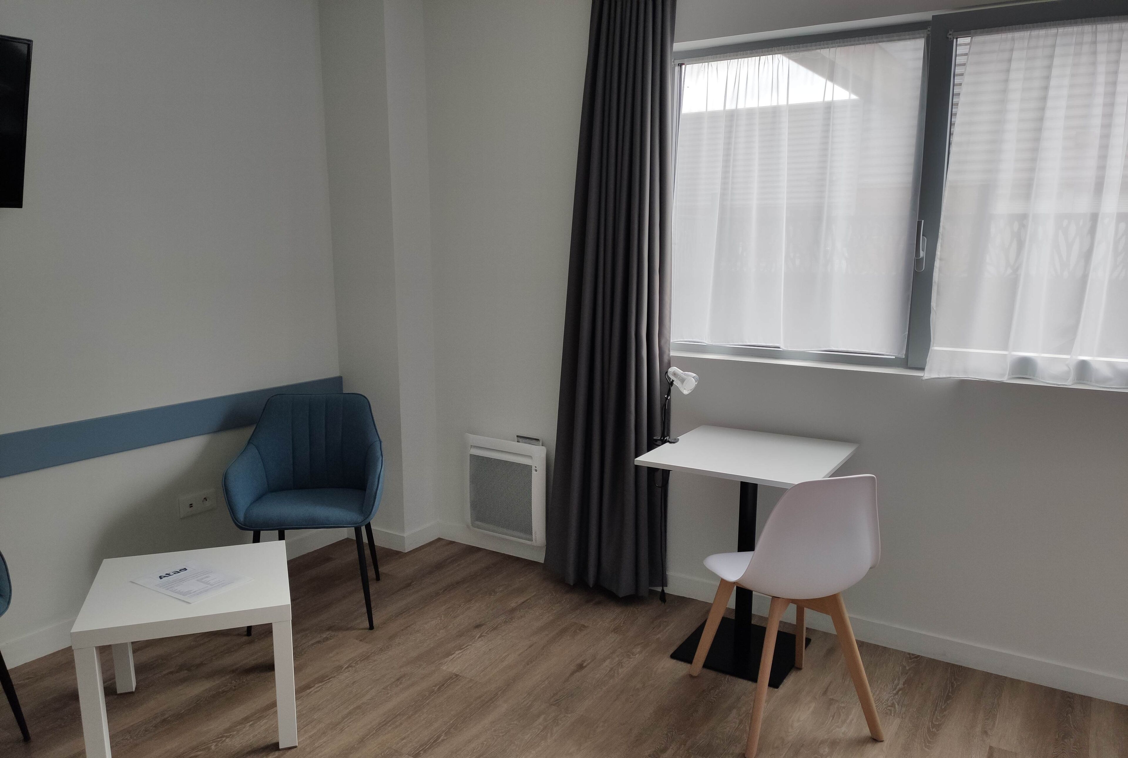 individually decorated, individually furnished, desk, blackout curtains