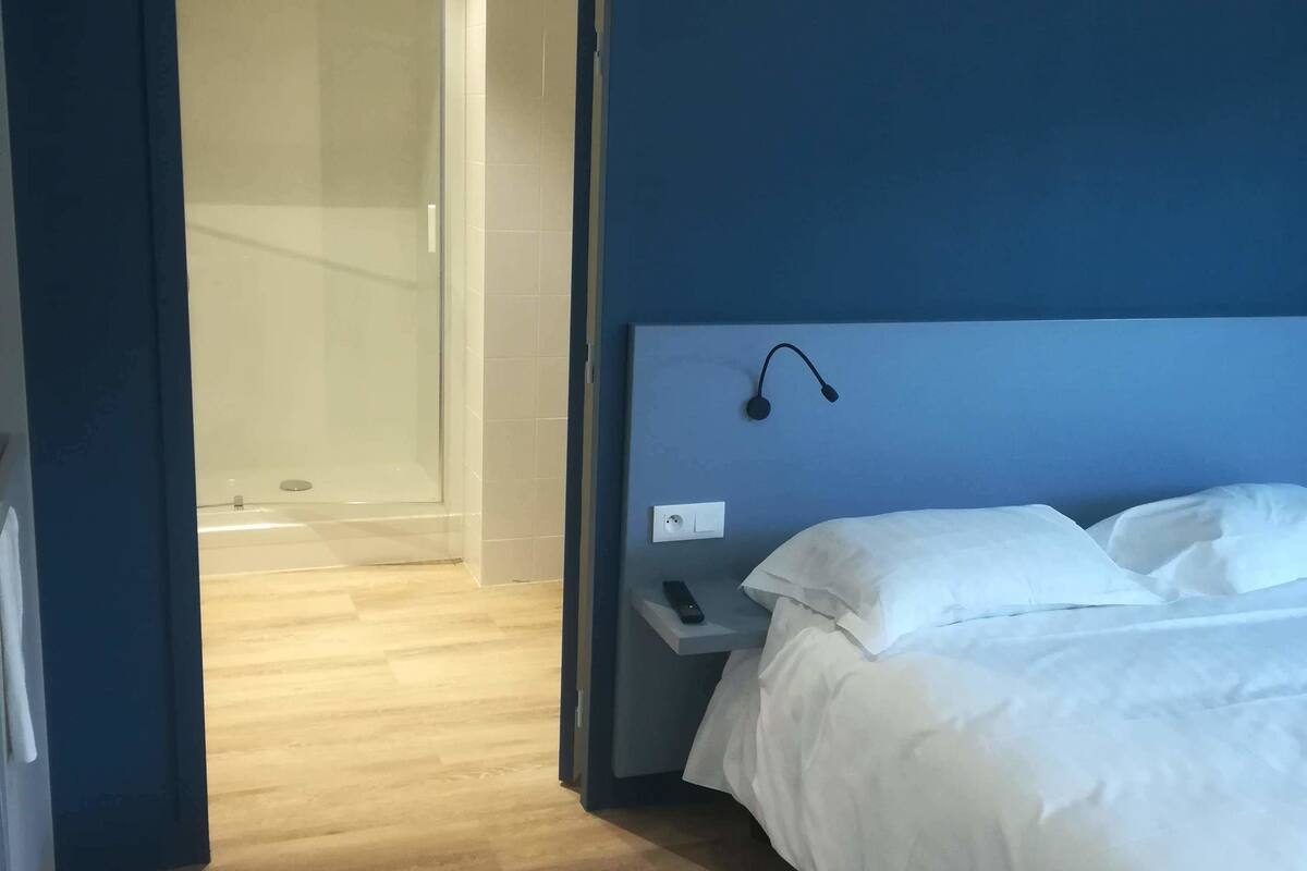 classic double room, 1 queen bed | individually decorated, individually furnished, desk, blackout curtains