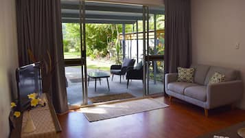 2 Bedroom Holiday Home | Living area | Flat-screen TV, iPod dock