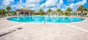 A heated pool, sun loungers
