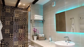 Hair dryer, towels, soap, shampoo