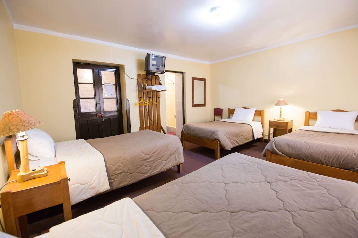 Chambre Triple, 3 lits une place