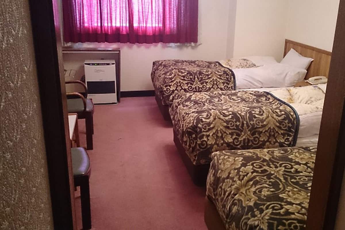 Blackout curtains, free WiFi, bed sheets