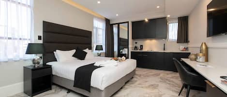 Ropa de cama de alta calidad y minibar