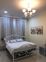 Family Room | Premium bedding, desk, iron/ironing board, free WiFi
