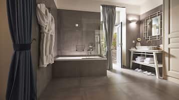 Senior Suite, Garden View (Queen Suite) | Bathroom | Free toiletries, hair dryer, bathrobes, slippers