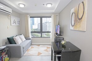 Appartement Panoramique, 1 chambre, non-fumeurs | Coin séjour | TV connectée, Netflix