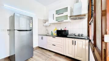 Fridge, microwave, coffee/tea maker, electric kettle