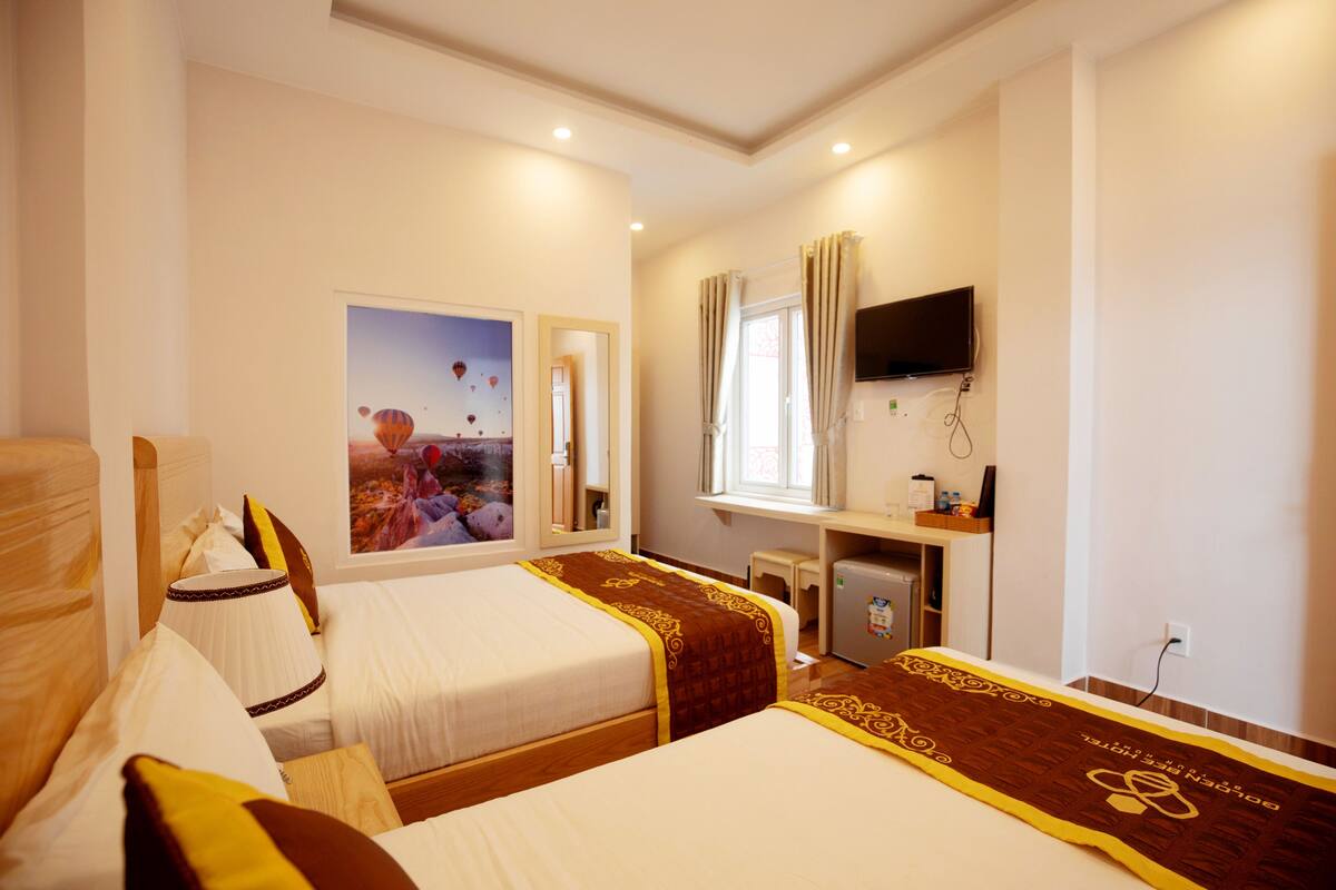 Select Comfort beds, minibar, desk, laptop workspace