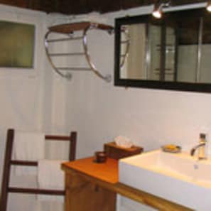 Shower, rainfall showerhead, hair dryer, towels
